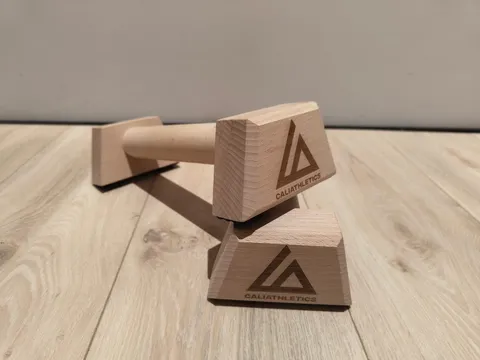 Caliathletics Wooden Parallettes Mini, the pair on a wooden floor